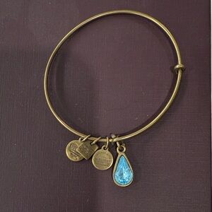 Alex and Ani Gold Bangle Bracelet with Blue Charm
